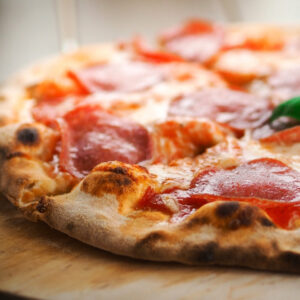 Whole pizza with one meat topping